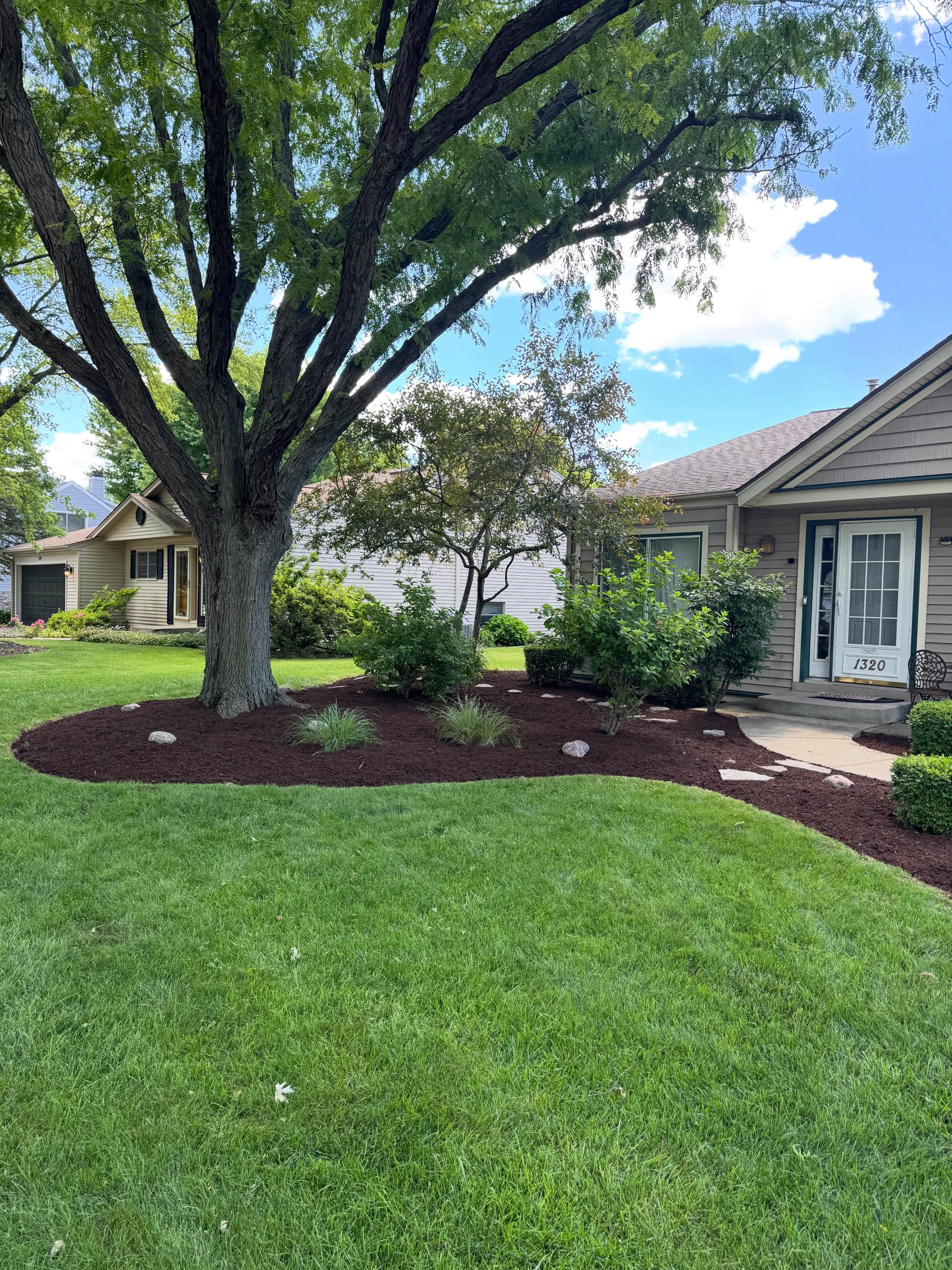Oak Ridge Lawn Care crew working on a lawn in Oak Ridge, Tennessee